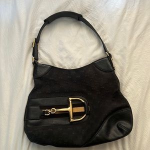 Vintage black Gucci horse bit purse